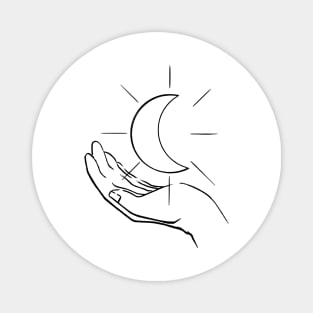 Hand holding moon Magnet